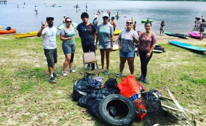 Biologia da Unicnec realiza atividade de limpeza em lagoa de Osório